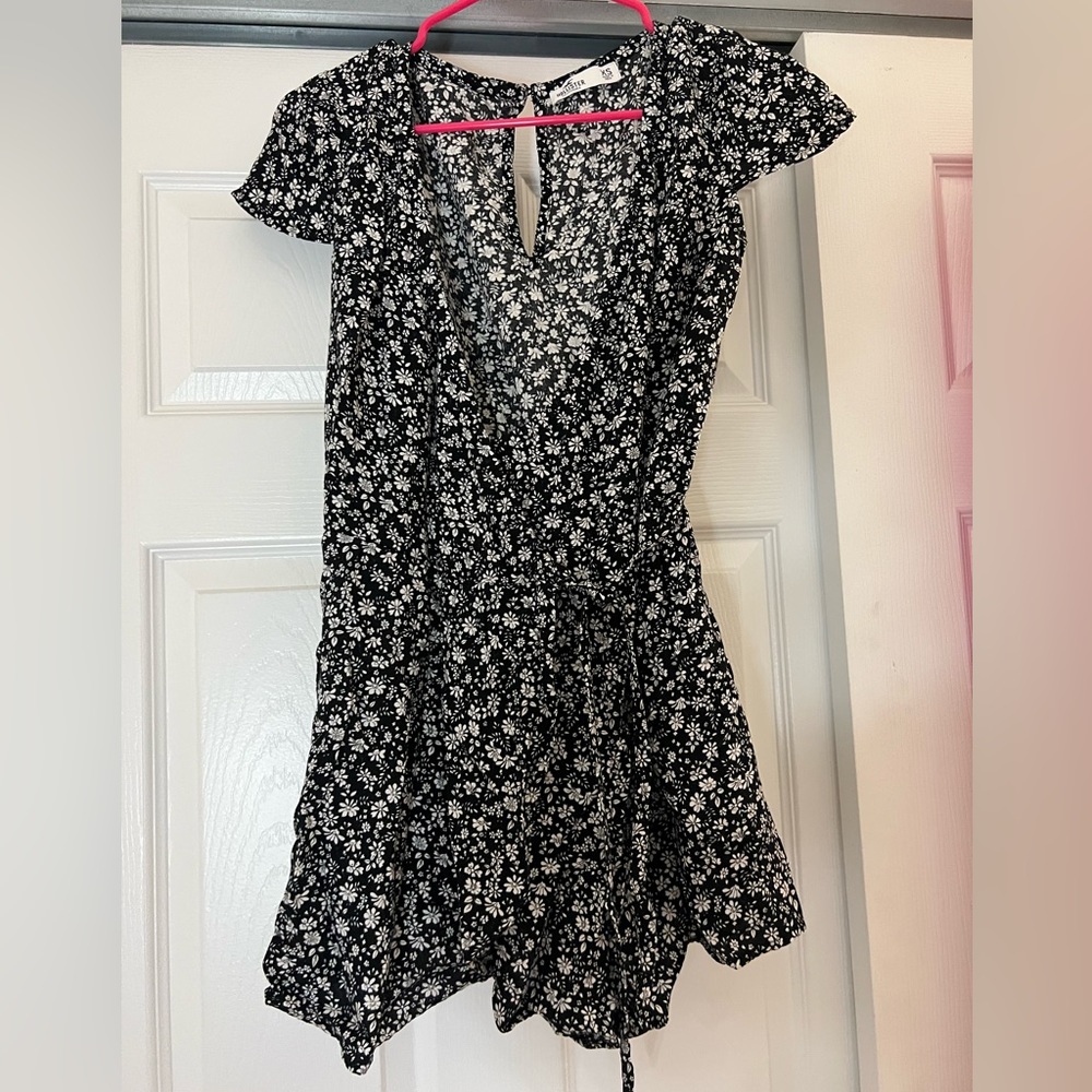 Xs floral romper from hollister, can fit like a small also. Super light/comfy